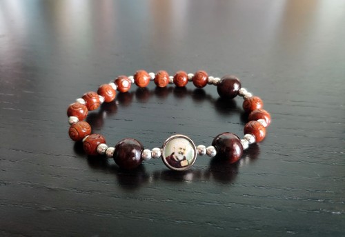 Bracciale elastico con - bracciale,