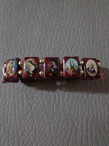 Bracciale legno con santi - in,